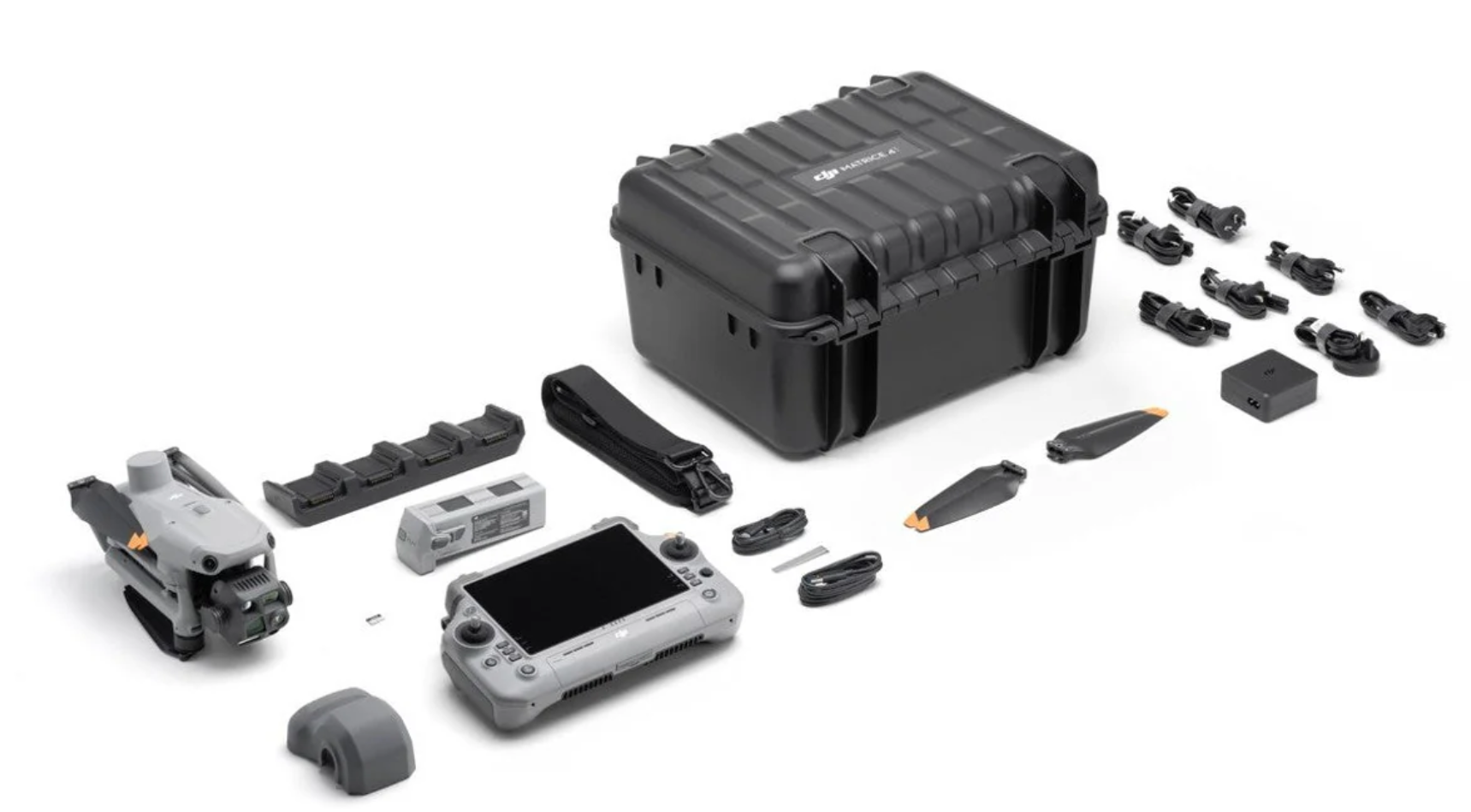 DJI Matrice 4T thermal drone complete kit contents laid out including folded aircraft with 640x512 thermal camera RC Plus 2 enterprise controller flight battery 100W charging hub storage case shoulder strap propellers gimbal protector cables and microSD card best price Covert Drones